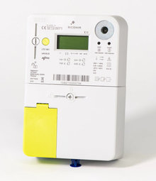 afbeelding van een digitale meter met elektronisch display, gele drukknop en ingang gebruikerspoort